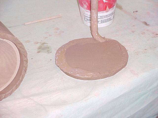 Applying slip to the the base