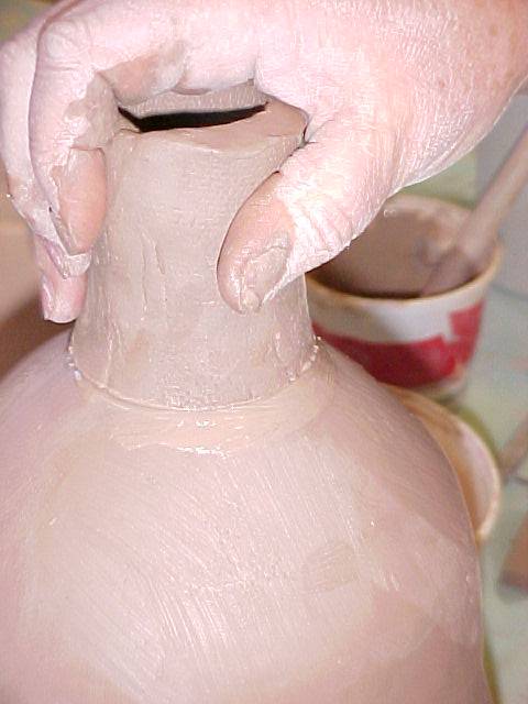 Attaching jug to spout